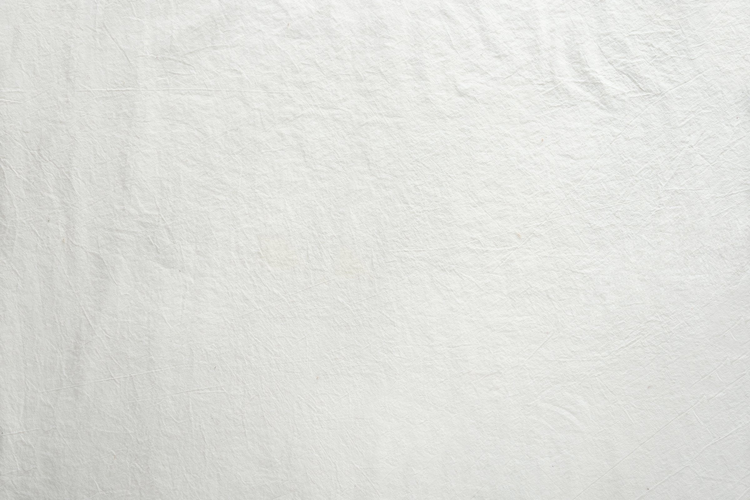 Off White Cotton Textile Background. Flat Lay, Top View, Textured Textile Backdrop. Copy-Space, Place for Text.